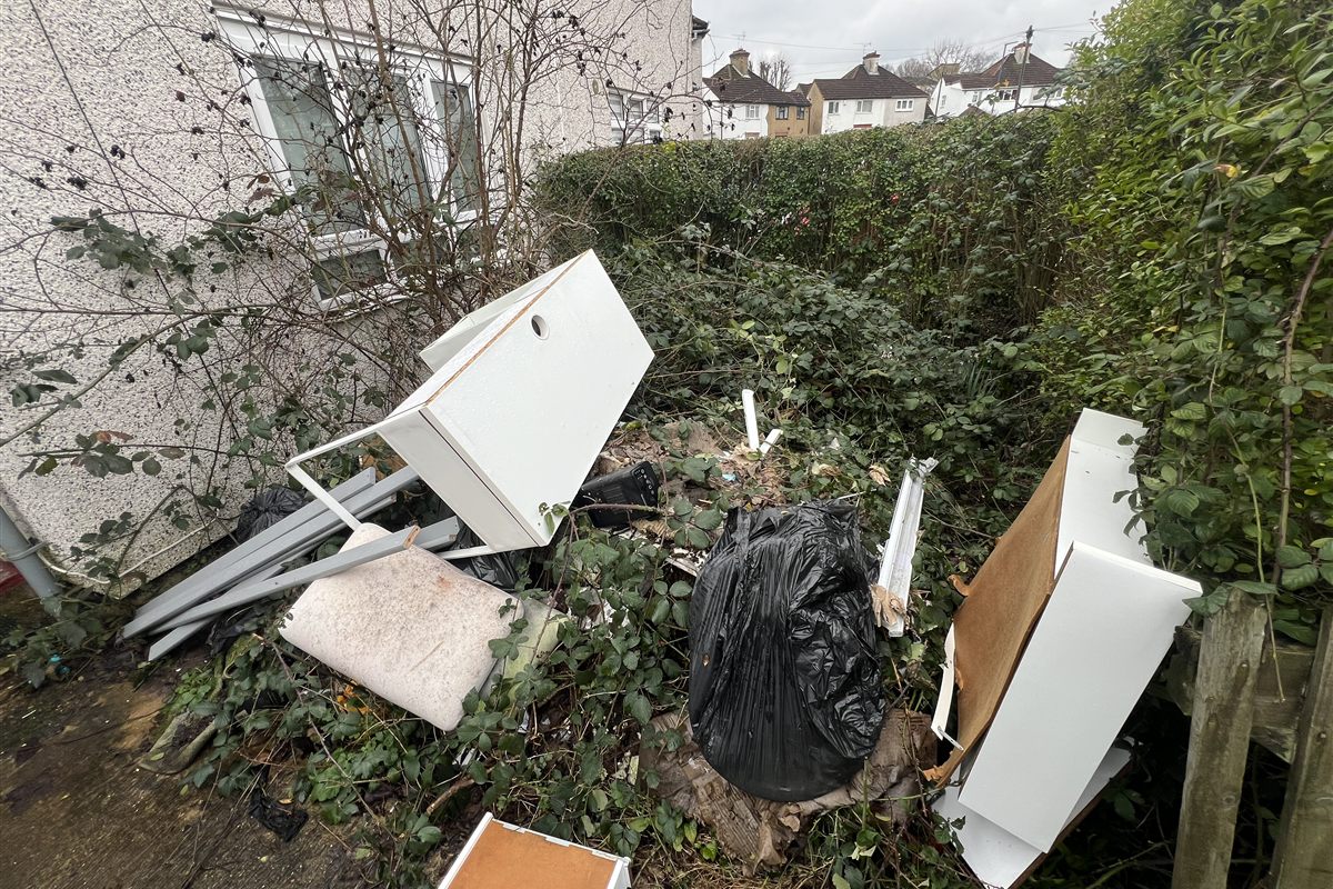 Garden clearance with bulky household and outdoor waste ready for collection